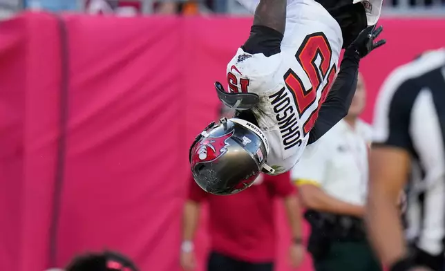 Tampa Bay Buccaneers wide receiver Tez Johnson celebrates after catching a touchdown pass against the San Francisco 49ers during the second half of an NFL football game in Tampa, Fla., Sunday, Oct. 12, 2025. (AP Photo/Chris O'Meara)