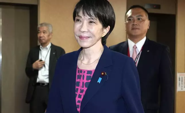 Sanae Takaichi, the newly-elected leader of Japan's ruling party, the Liberal Democratic Party (LDP), leaves the LDP headquarters in Tokyo, Friday, Oct. 10, 2025. (Keisuke Hosojima/Kyodo News via AP)