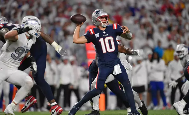New England Patriots quarterback Drake Maye (10) throws against the Buffalo Bills during the second half of an NFL football game, Sunday, Sept. 5, 2025, in Orchard Park, N.Y. (AP Photo/Adrian Kraus)
