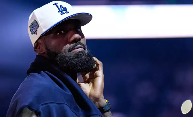 Los Angeles Lakers' Lebron James stands on the court before an NBA basketball preseason game against the Golden State Warriors, Sunday, Oct. 5, 2025, in San Francisco. (AP Photo/Godofredo A. Vásquez)