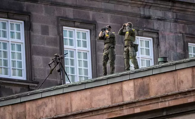 Security watch over the Danish parliament at Christiansborg Castle in Copenhagen as Denmark is hosting an informal summit for the EUs heads of state and government, Wednesday, Oct. 1, 2025 . (Mads Claus Rasmussen/Ritzau Scanpix via AP)