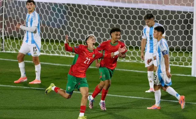Morocco's Yassir Zabiri celebrates scoring his side's second goal against Argentina during the FIFA U-20 World Cup final soccer match in Santiago, Chile, Sunday, Oct. 19, 2025. (AP Photo/Gustavo Garello)