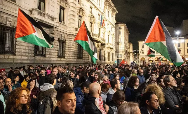 People demonstrate in solidarity with the Global Sumud Flotilla on Wednesday, Oct. 1, 2025, in Milan, Italy, after ships were intercepted by the Israeli navy. (Marco Ottico/LaPresse via AP)