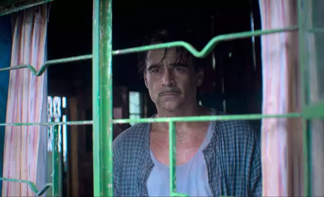 This image released by Netflix shows Colin Farrell in a scene from "Ballad of a Small Player." (Netflix via AP)