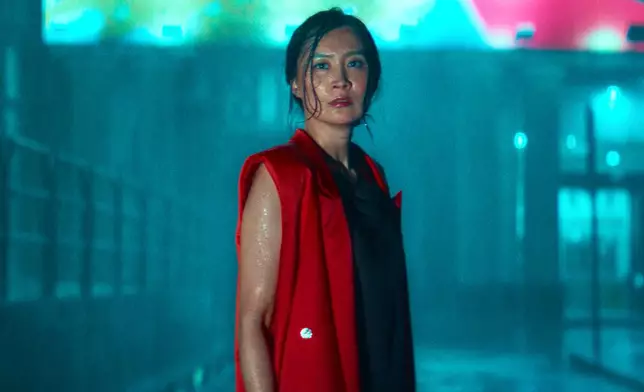 This image released by Netflix shows Fala Chen in a scene from "Ballad of a Small Player." (Netflix via AP)