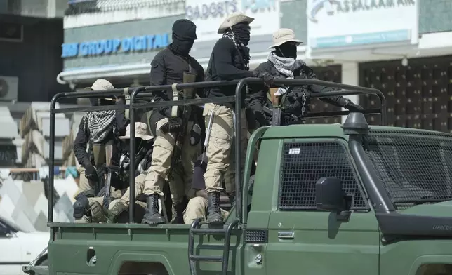 Police patrol the streets on election day in Zanzibar, Tanzania, Thursday, Oct. 30, 2025. (AP Photo)