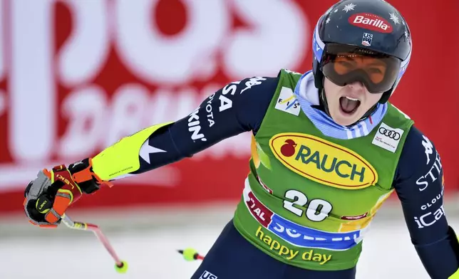 United States' Mikaela Shiffrin celebrates at the finish area of an alpine ski, women’s World Cup giant slalom, in Soelden, Austria, Saturday, Oct. 25, 2025. Gian Ehrenzeller/Keystone via AP)