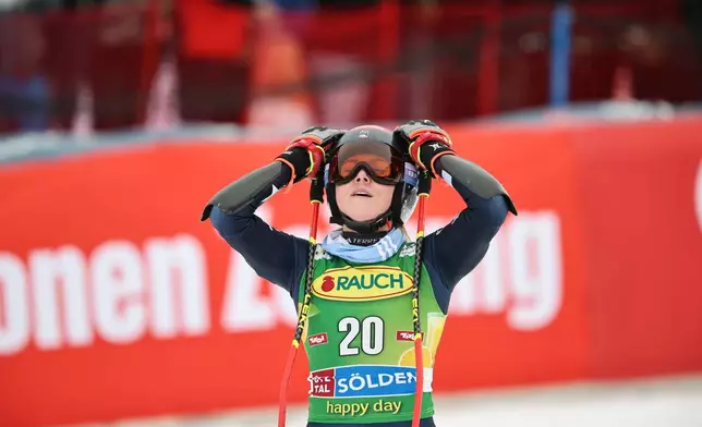 United States' Mikaela Shiffrin celebrates at the finish area of an alpine ski, women's World Cup giant slalom, in Soelden, Austria, Saturday, Oct. 25, 2025. (AP Photo/Marco Trovati)