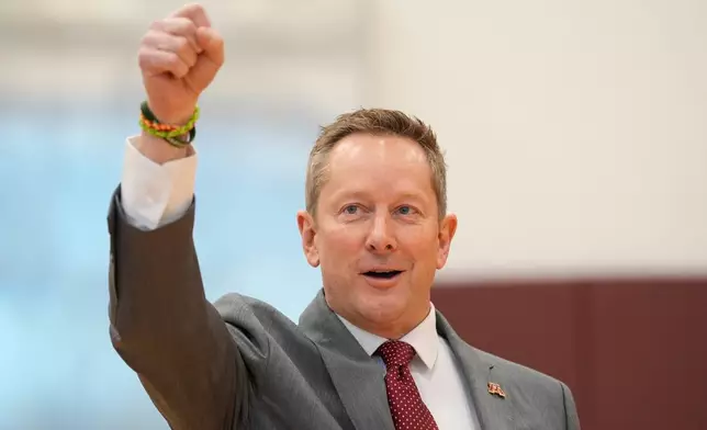 FILE - Minnesota's head coach Niko Medved gestures while arriving for an NCAA college basketball news conference, March 25, 2025, in Minneapolis. (AP Photo/Abbie Parr, File)