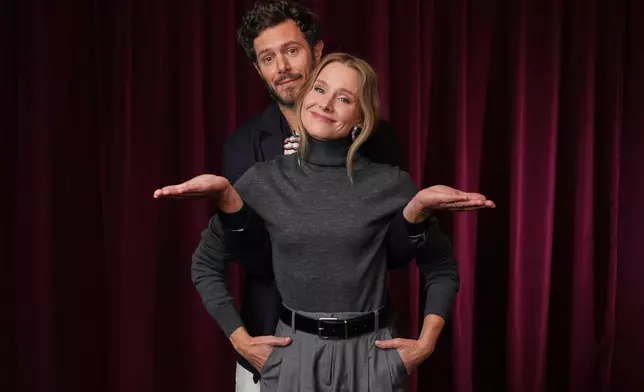 Adam Brody, left, and Kristen Bell, cast members in the Netflix series "Nobody Wants This," pose for a portrait in Los Angeles on Oct. 16, 2025. (AP Photo/Chris Pizzello)