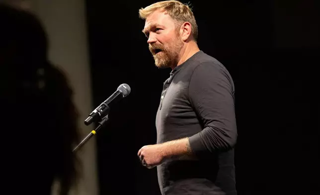 Senate candidate Graham Platner speaks at a town hall at the Franco Center in Lewiston on Wednesday, Oct. 15, 2025. (Libby Kenny/Sun Journal via AP)