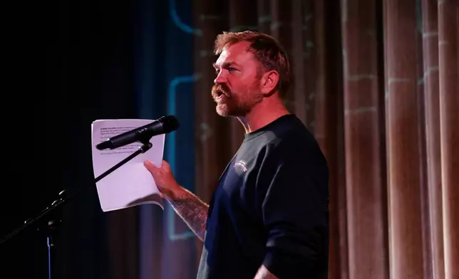 Democratic Maine Senate candidate Graham Platner speaks at a town hall in Ogunquit, Maine, Wednesday, Oct. 22, 2025. (AP Photo/Caleb Jones)