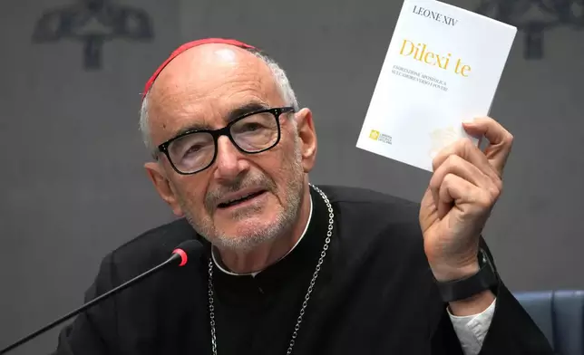 Cardinal Michael Czerny attends a press conference at the Vatican to present Pope Leo XIV's exhortation "Dilexi te"about love for the poor, Thursday, Oct. 9, 2025. (AP Photo/Domenico Stinellis)