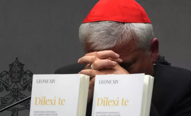 Cardinal Konrad Krajewski attends a press conference at the Vatican to present Pope Leo XIV's exhortation "Dilexi te"about love for the poor, Thursday, Oct. 9, 2025. (AP Photo/Domenico Stinellis)