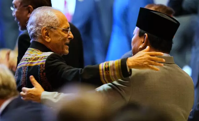 East Timor's President Jose Ramos-Horta, left, and Indonesian President Prabowo Subianto greet each other during the 47th ASEAN summit opening ceremony in Kuala Lumpur, Malaysia, Sunday, Oct. 26, 2025. (AP Photo/Vincent Thian)