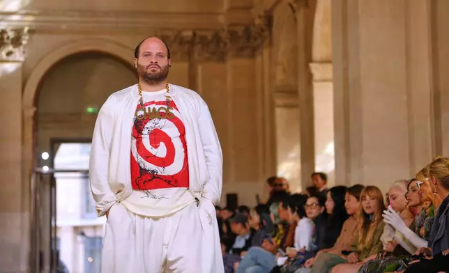 A model wears a creation as part of the Vivienne Westwood Spring/Summer 2026 collection presented in Paris, Saturday, Oct. 4, 2025. (AP Photo/Aurelien Morissard)
