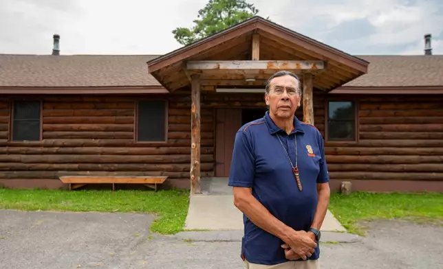 FILE - Tadodaho Sid Hill, takes a break from meetings to pose for a portrait outside of the Onondaga Nation's longhouse, Thursday, Aug. 3, 2023, on the Onondaga Nation territory in central New York. (AP Photo/Lauren Petracca, File)