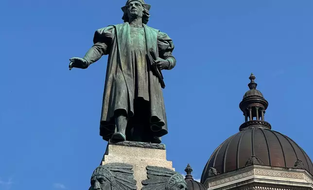 A statue of Christopher Columbus stands in downtown Syracuse, N.Y, Friday, Sept. 5, 2025. (AP Photo/Michael Hill)