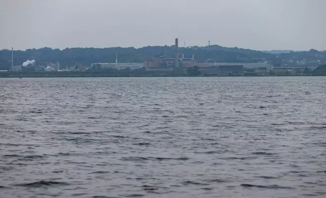 FILE - Industrial buildings sit on the shores of Onondaga Lake, Thursday, Aug. 3, 2023, in Syracuse, N.Y. (AP Photo/Lauren Petracca, File)