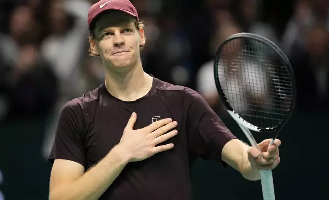 Italy's Jannik Sinner celebrates after winning the final match of the Paris Masters tennis tournament against Canada's Felix Auger-Aliassime in Paris, Sunday, Nov. 2, 2025. (AP Photo/Christophe Ena)
