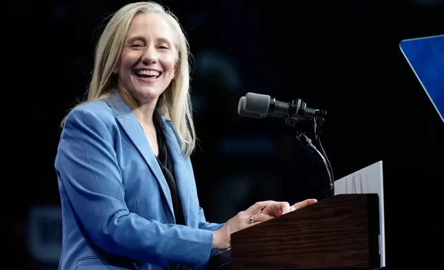Virginia Democratic gubernatorial candidate Abigail Spanberger speaks during a campaign event with former President Barack Obama, Saturday, Nov. 1, 2025, in Norfolk, Va. (AP Photo/Steve Helber)
