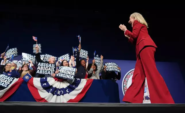 Democrat Abigail Spanberger walks out on stage after she was declared the winner of the Virginia governor's race during an election night watch party Tuesday, Nov. 4, 2025, in Richmond, Va. (AP Photo/Stephanie Scarbrough)
