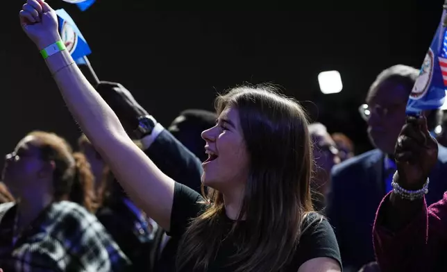 People cheer during an election night watch party for Virginia Democratic gubernatorial candidate Abigail Spanberger, Tuesday, Nov. 4, 2025, in Richmond, Va. (AP Photo/Stephanie Scarbrough)
