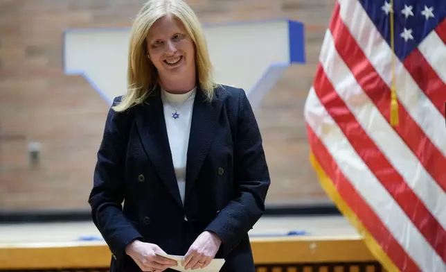 FILE - NYPD Commissioner Jessica Tisch steps off the stage after speaking during her swearing in ceremony at police headquarters in New York, Nov. 25, 2024. (AP Photo/Seth Wenig, file)
