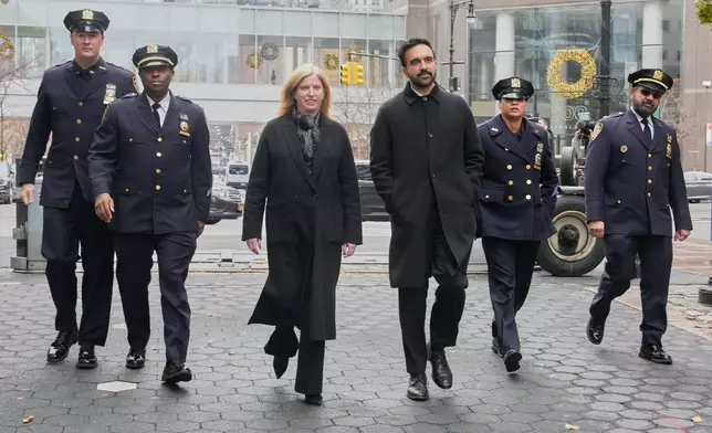New York Mayor-elect Zohran Mamdani and New York City Police Commissioner Jessica Tisch walk to the New York City Police Memorial, Wednesday, Nov. 19, 2025. (AP Photo/Richard Drew)
