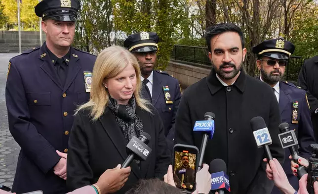 New York Mayor-elect Zohran Mamdani and New York City Police Commissioner Jessica Tisch meet the media after their visit to the New York City Police Memorial, Wednesday, Nov. 19, 2025. (AP Photo/Richard Drew)