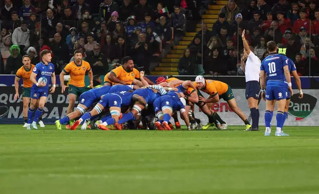 The scrum during the rugby union match between Italy and Australia in Udine, Italy, Saturday, Nov. 8, 2025. (Andrea Bressanutti/LaPresse via AP)