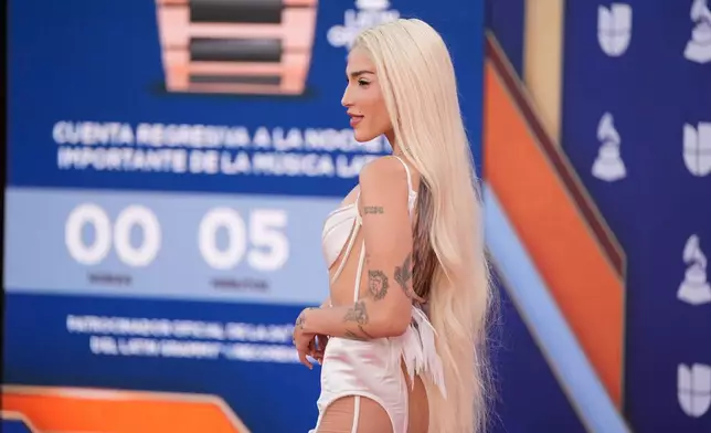 Elena Rose arrives at the 2025 Latin Grammys on Thursday, Nov. 13, 2025, at MGM Grand in Las Vegas. (AP Photo/John Locher)