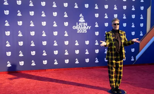 Fito Paez arrives at the 2025 Latin Grammys on Thursday, Nov. 13, 2025, at MGM Grand in Las Vegas. (AP Photo/John Locher)