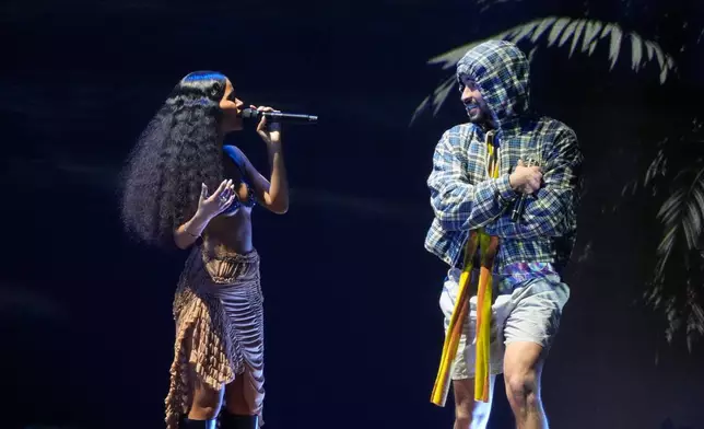 Chuwi and Bad Bunny perform during the 2025 Latin Grammys on Thursday, Nov. 13, 2025, at MGM Grand in Las Vegas. (AP Photo/Chris Pizzello)