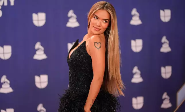 Karol G arrives at the 2025 Latin Grammys on Thursday, Nov. 13, 2025, at MGM Grand in Las Vegas. (AP Photo/John Locher)