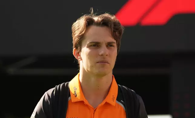 McLaren driver Oscar Piastri, of Australia, arrives to the Hermanos Rodriguez race track ahead the Formula One Mexico Grand Prix in Mexico City, Saturday, Oct. 25, 2025. (AP Photo/Moises Castillo)