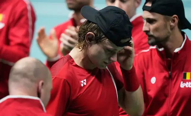 Belgium's Zizou Bergs reacts after losing against Italy's Flavio Cobolli in a Davis Cup singles semifinal match between Italy and Belgium, in Bologna, Italy, Friday, Nov. 21, 2025. (AP Photo/Luca Bruno)