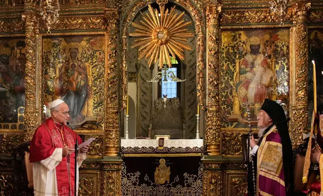 Pope Leo XIV and Ecumenical Patriarch Bartholomew I, the spiritual leader of the world's Eastern Orthodox Christians attend the Doxology at the Patriarchal Church of Saint George, in Istanbul, Turkey, Saturday, Nov. 29, 2025. (AP Photo/Emrah Gurel)