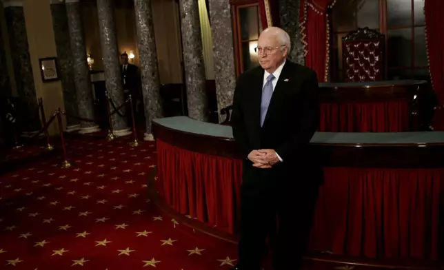 FILE - Vice President Dick Cheney awaits another Senator in the Old Senate Chamber on Capitol Hill in Washington in this Jan. 4, 2007 file photo, where he administered the Senate oath during re-enactment swearing-in ceremonies. (AP Photo/Evan Vucci, File)