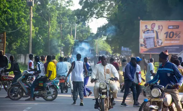 Supporters of opposition presidential candidate Issa Tchiroma, protest on the streets of Garoua, Cameroon, Sunday, Oct. 26, 2025. (AP Photo/Welba Yamo Pascal)