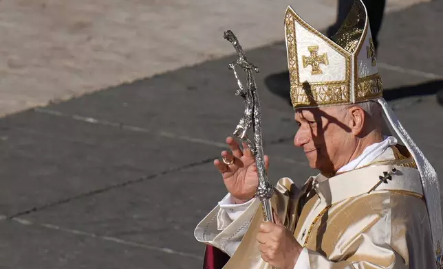 Pope Leo XIV leaves after a Mass for the Jubilee of the Choirs in St. Peter's Square, at the Vatican, Sunday, Nov. 23, 2025. (AP Photo/Alessandra Tarantino)
