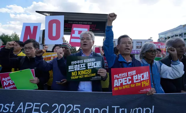 Protesters against the 2025 Asia-Pacific Economic Cooperation (APEC) and United States President Donald Trump gather in Gyeongju, South Korea, Saturday, Nov. 1, 2025. (AP Photo/Ng Han Guan)