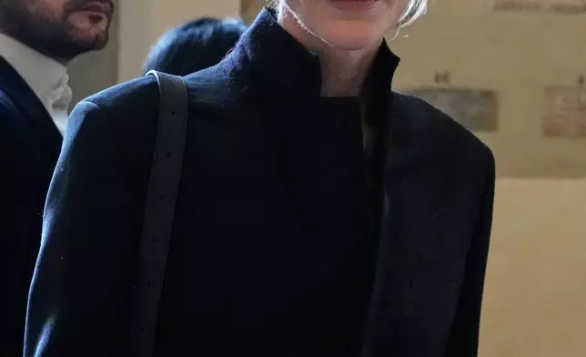 Actress Cate Blanchett leaves at the end of an audience of Pope Leo XIV with actors and directors from the cinema, at the Vatican, Saturday, Nov. 15, 2025. (AP Photo/Gregorio Borgia)