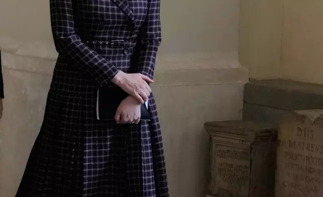 Actress Greta Gerwig leaves at the end of an audience of Pope Leo XIV with actors and directors from the cinema, at the Vatican, Saturday, Nov. 15, 2025. (AP Photo/Gregorio Borgia)