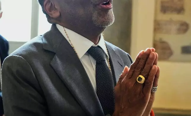 Film Director Spike Lee gestures as he leaves at the end of an audience of Pope Leo XIV with actors and directors from the cinema at the Vatican, Saturday, Nov. 15, 2025. (AP Photo/Gregorio Borgia)