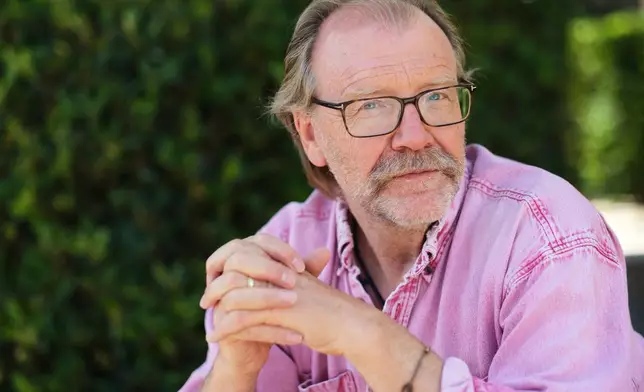 FILE - Author George Saunders poses for a portrait on Aug. 20, 2025, in Santa Monica, Calif. (AP Photo/Chris Pizzello, file)
