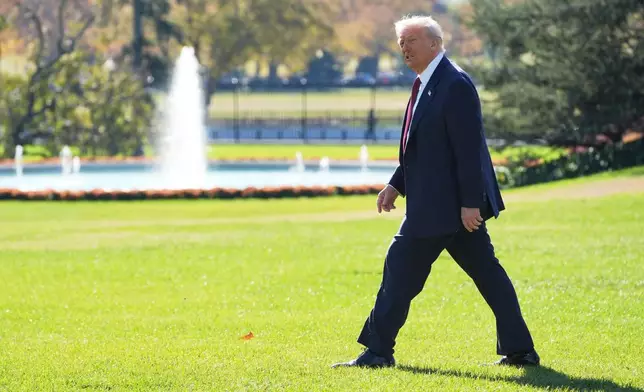 President Donald Trump walks out to board Marine One on the South Lawn of the White House, Wednesday, Nov. 5, 2025, in Washington. (AP Photo/Evan Vucci)