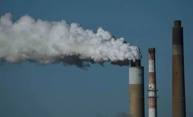 FILE - The Warrick Power Plant, a coal-powered generating station, operates April 8, 2025, in Newburgh, Ind. (AP Photo/Joshua A. Bickel, File)
