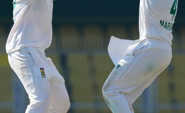 South Africa's players celebrate the dismissal of India's captain Rishab Pant on the fifth day of the second cricket test match between India and South Africa in Guwahati, India, Saturday, Nov. 22, 2025. (AP Photo/Anupam Nath)