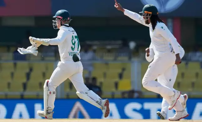South Africa's players celebrate the dismissal of India's Sai Sudharsan on the fifth day of the second cricket test match between India and South Africa in Guwahati, India, Saturday, Nov. 22, 2025. (AP Photo/Anupam Nath)
